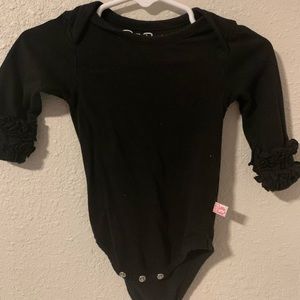 Ruffle butts 3-6 m long sleeve black body suit. GUC.